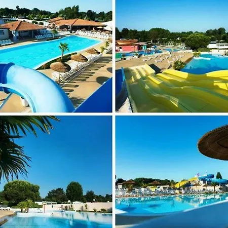 Les Charmettes: Spacious Mobile In 4-star Leisure Village Campsite